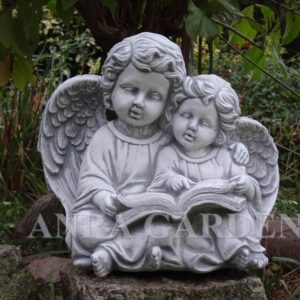 Figura dwóch aniołków z książką